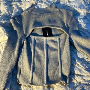 Light gray mock neck blouse with exposed chest